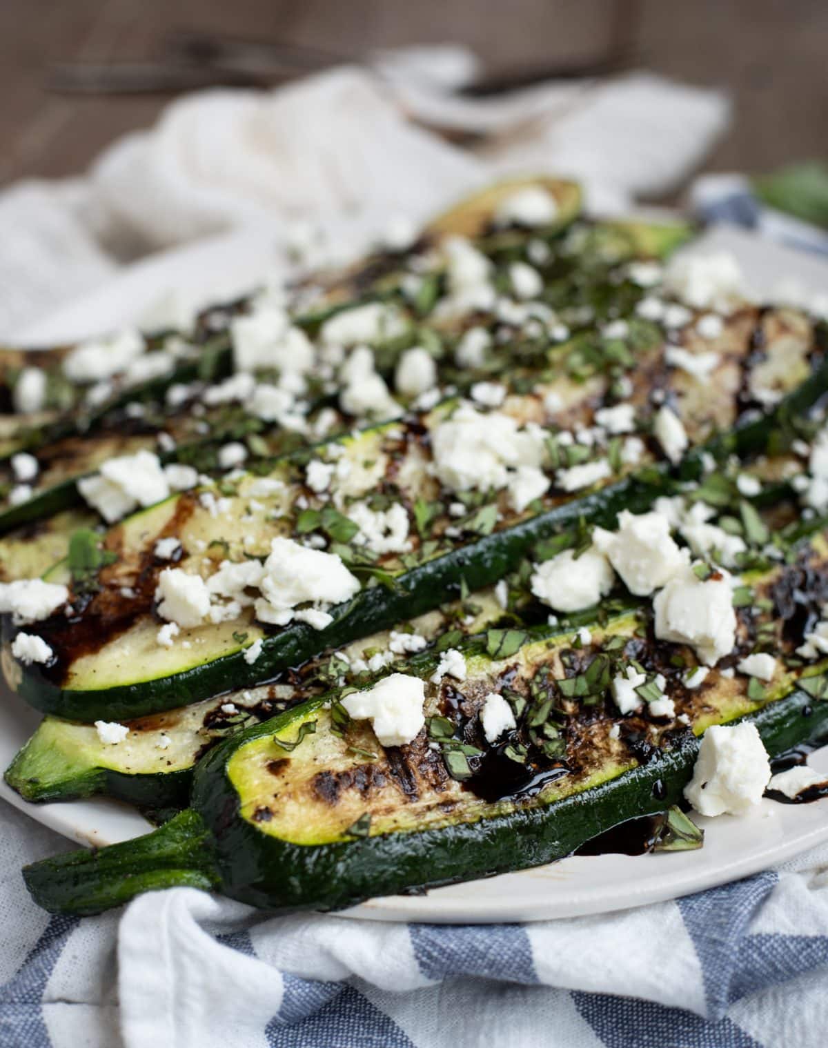 Grilled Zucchini with Balsamic Glaze, Basil, and Feta - Feasting not ...